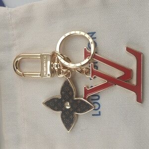 Louis Vuitton Gold Hardware Red LV Logo Keychain with Monogram Flower Charm